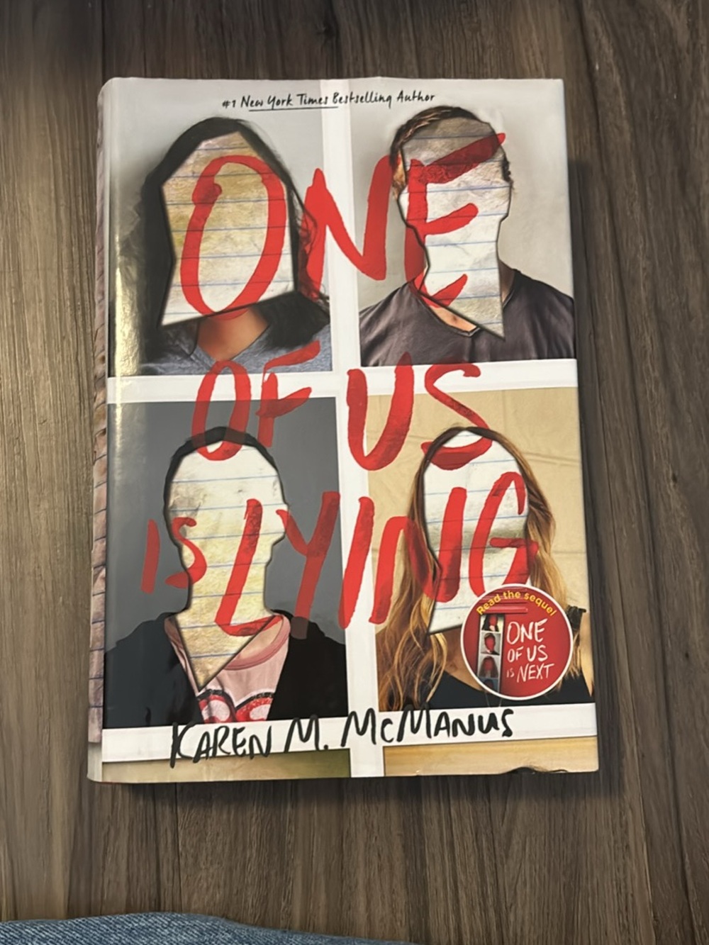 One of Us Is Lying by Karen M. McManus - Hardcover with Red Lettering